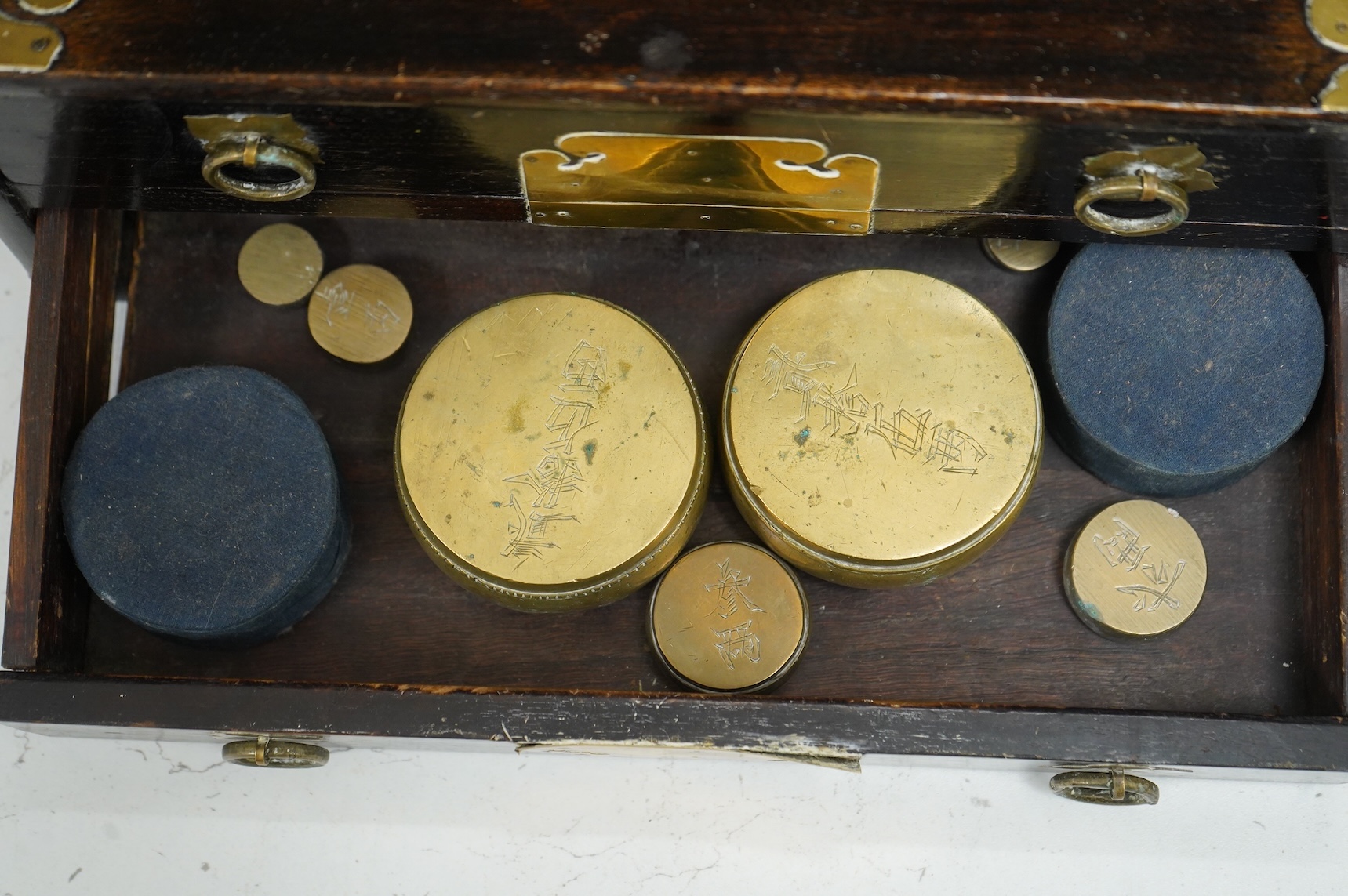 A pair of 19th century Japanese wood and brass mounted scales and weights, 31.5cm wide